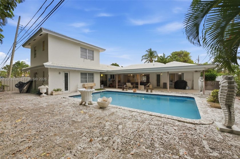Beautifully maintained 4-bedroom, 3.5-bath pool home located in - Beach Home for sale in Deerfield Beach, Florida on Beachhouse.com
