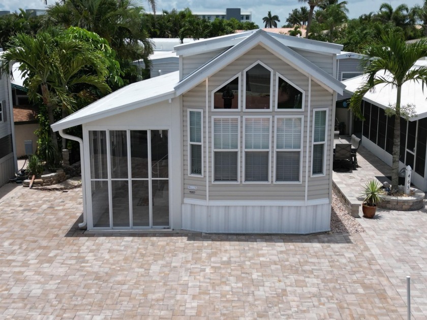 Experience luxury living in this pristine 2021 Chariot Eagle - Beach Home for sale in Melbourne Beach, Florida on Beachhouse.com