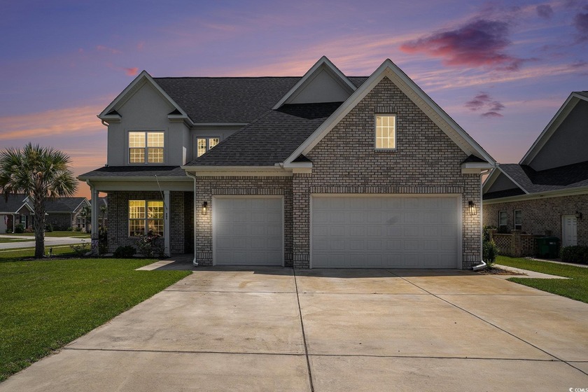 Welcome to this stunning custom-built home nestled in the gated - Beach Home for sale in Myrtle Beach, South Carolina on Beachhouse.com