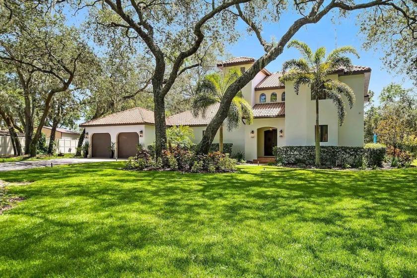 BEAUTIFUL PRIVATE OASIS SITUATED ON OVER 14 ACRES. CUSTOM BUILT - Beach Home for sale in Tampa, Florida on Beachhouse.com