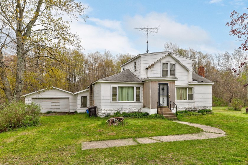 Opportunity knocks in Covert! This 4-bedroom, 2-bath home sits - Beach Home for sale in Covert, Michigan on Beachhouse.com