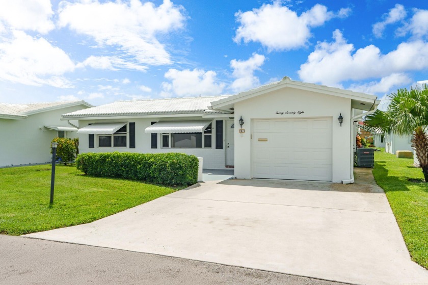 Your Florida oasis awaits here at Palm Beach Leisureville! This - Beach Home for sale in Boynton Beach, Florida on Beachhouse.com