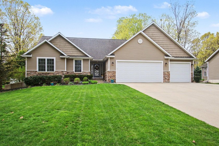 Beautifully updated ranch home in a prime location steps from - Beach Home for sale in Holland, Michigan on Beachhouse.com