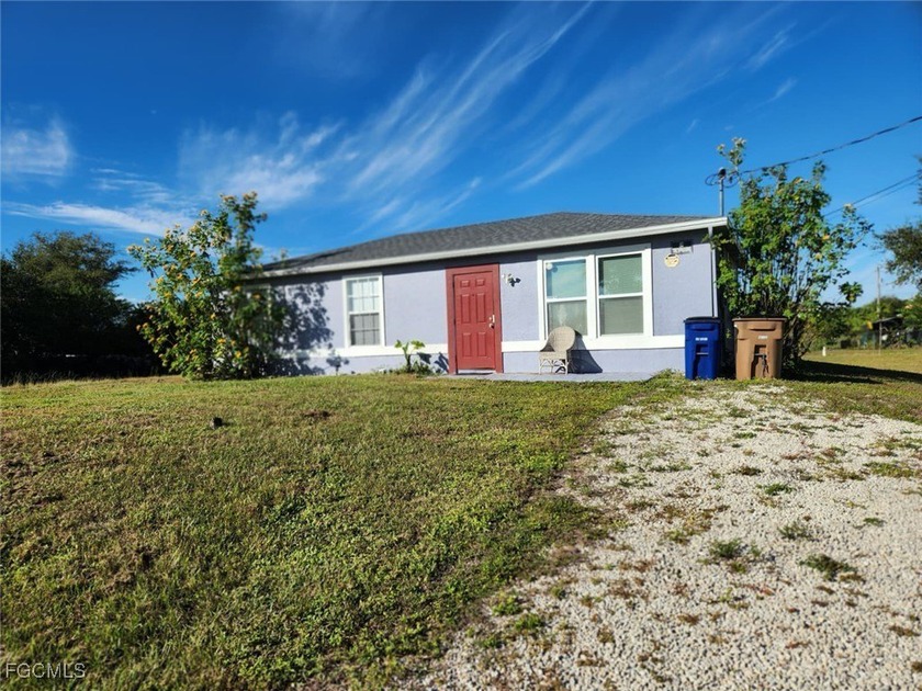 Move-in ready 3-bedroom, 2-bath home on a spacious 1/2-acre lot - Beach Home for sale in Lehigh Acres, Florida on Beachhouse.com