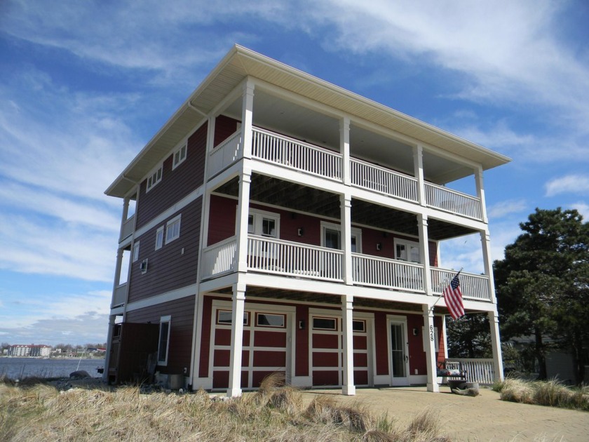 BUTTERSVILLE PENINSULA LANDMARK!!! - This unique three-story - Beach Home for sale in Ludington, Michigan on Beachhouse.com