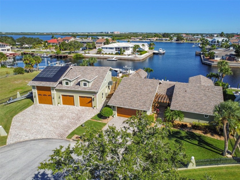 Discover your dream waterfront home with a carriage house! - Beach Home for sale in New Port Richey, Florida on Beachhouse.com
