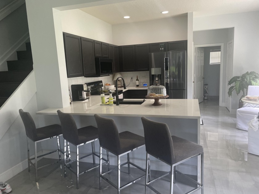 Gorgeous & Upgraded Lakefront/end unit with a 1 car garage - Beach Townhome/Townhouse for sale in Greenacres, Florida on Beachhouse.com