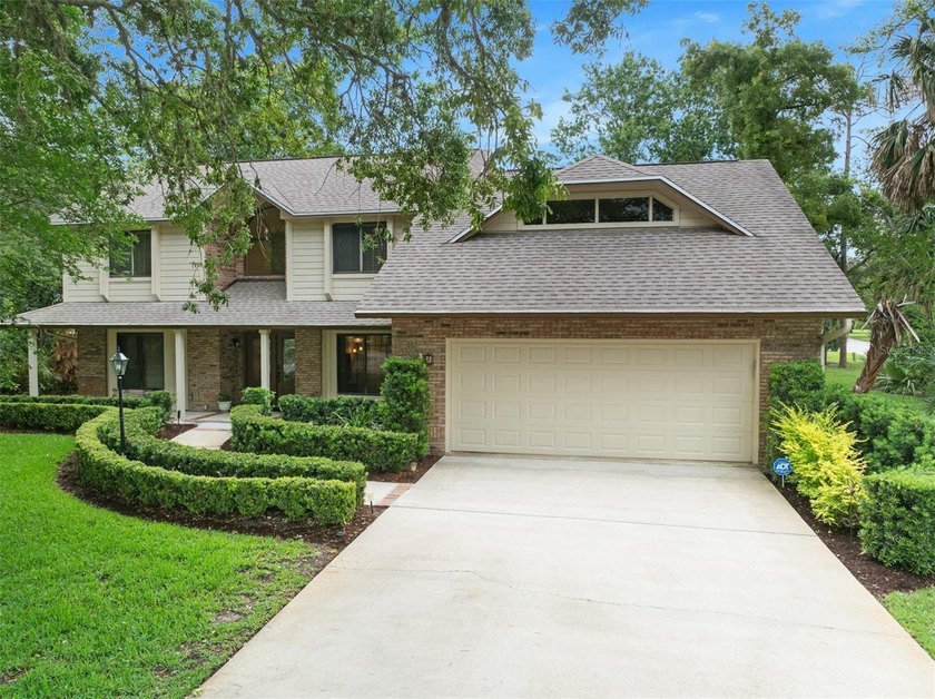 Custom-Built Brick Beauty in Breakaway Trails! Tucked away on a - Beach Home for sale in Ormond Beach, Florida on Beachhouse.com
