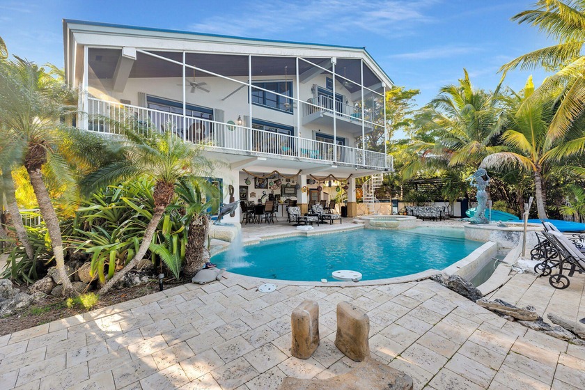 Experience refined bayfront living in this exceptional Key Largo - Beach Home for sale in Key Largo, Florida on Beachhouse.com