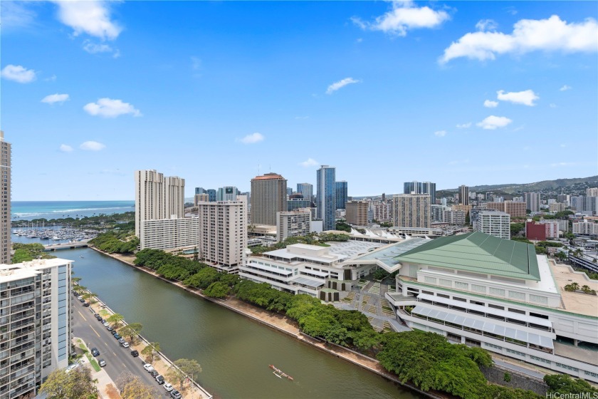 Wake up to panoramic views of the Ala Wai Canal, ocean, and city - Beach Condo for sale in Honolulu, Hawaii on Beachhouse.com