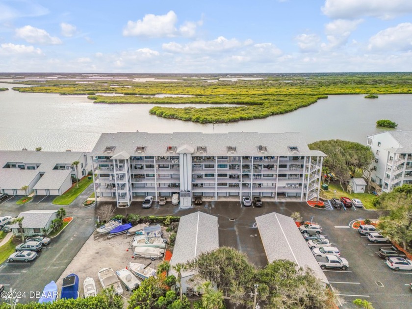 This fully furnished, 3-bedroom 2-bathroom condo home offers - Beach Condo for sale in New Smyrna Beach, Florida on Beachhouse.com