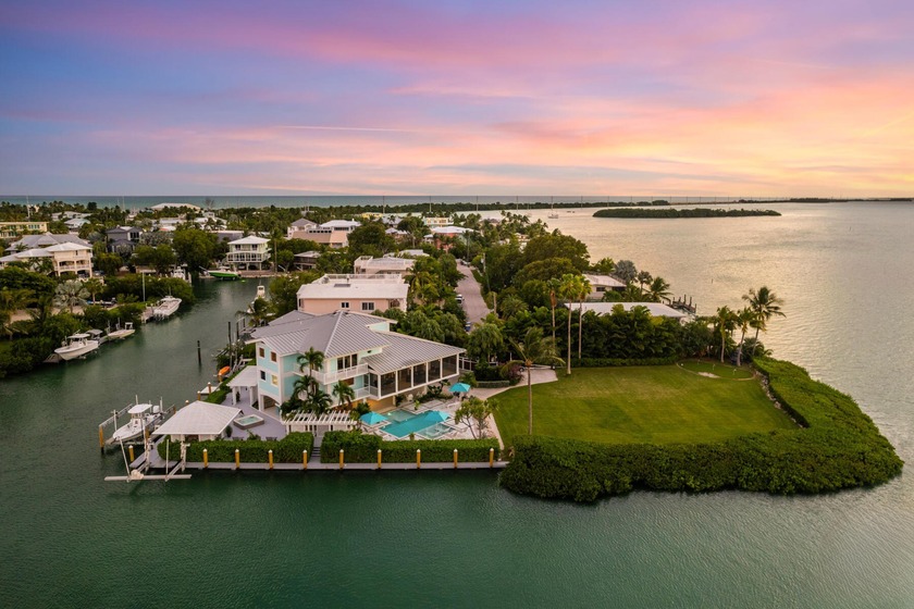 A refined expression of waterfront living, this six-bedroom - Beach Home for sale in Lower Matecumbe Key, Florida on Beachhouse.com
