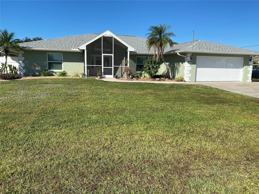 PRICE ADJUSTMENT!! UPDATED/UPGRADED 4 BEDROOM, 3 BATHROOM, POOL - Beach Home for sale in Punta Gorda, Florida on Beachhouse.com