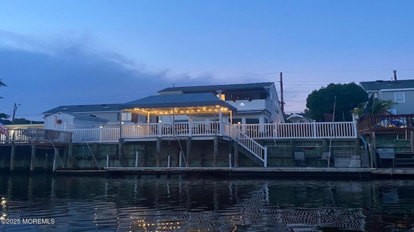 Modern Waterfront Retreat-TURNKEY RENTAL with $90K+ Annual - Beach Home for sale in Manahawkin, New Jersey on Beachhouse.com