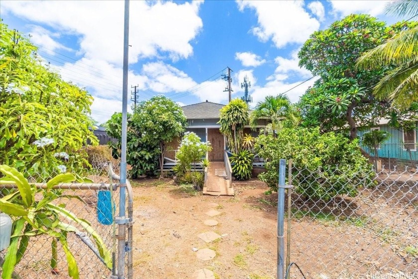 Unlock the potential of this property situated on an expansive - Beach Home for sale in Ewa Beach, Hawaii on Beachhouse.com