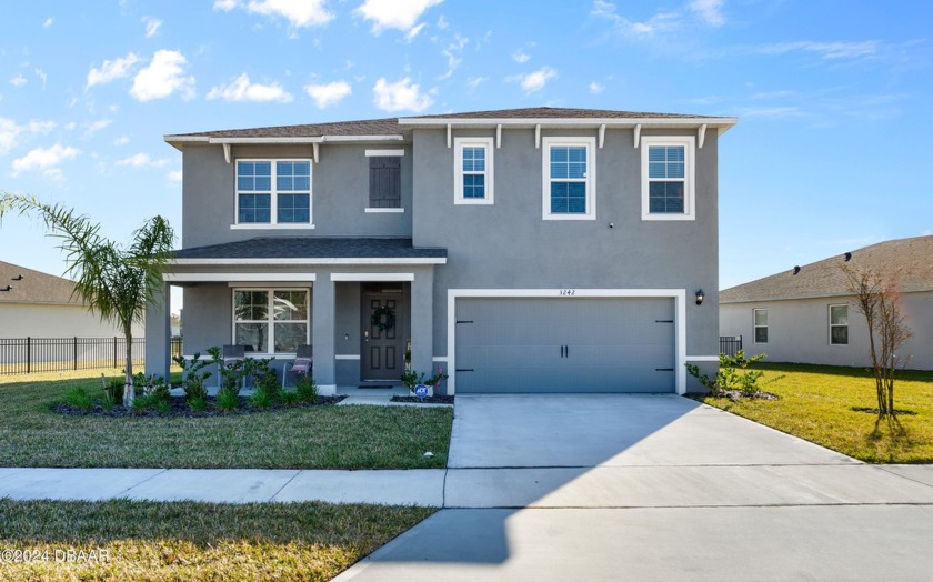This beautiful 5 bedroom, 3 bath 2 story home is in the - Beach Home for sale in New Smyrna Beach, Florida on Beachhouse.com