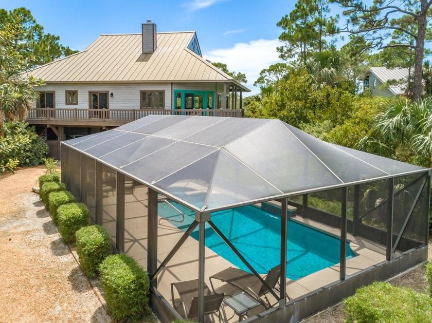 Nestled in the picturesque setting of St. George Island, this - Beach Home for sale in St. George Island, Florida on Beachhouse.com