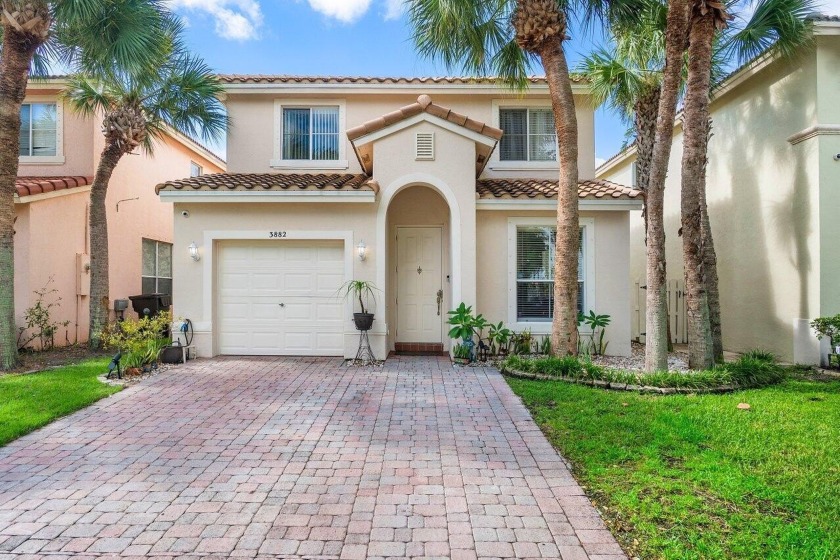 Impeccable 3-bedroom, 3-bath CBS home in the gated community of - Beach Home for sale in West Palm Beach, Florida on Beachhouse.com