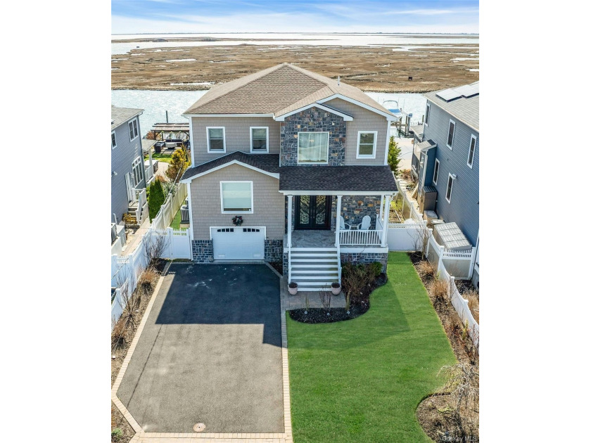A PICTURE AND A VIDEO IS WORTH A THOUSAND WORDS! ONCE IN A RARE - Beach Home for sale in Seaford, New York on Beachhouse.com