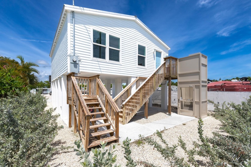 Featuring an outdoor elevator for convenient access, this newer - Beach Home for sale in Big Coppitt, Florida on Beachhouse.com