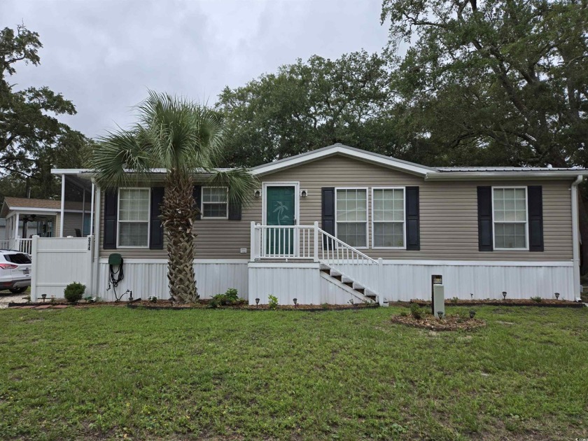 Price Reduced! WATER VIEW of the boat ramp & canal! Enjoy the - Beach Home for sale in Garden City Beach, South Carolina on Beachhouse.com