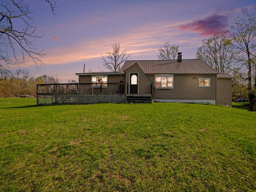 Tucked away on 10 peaceful acres in Oceana County, this charming - Beach Home for sale in Shelby, Michigan on Beachhouse.com