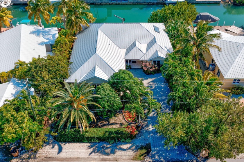 Tucked into the sought-after waterfront enclave of Cudjoe - Beach Home for sale in Cudjoe Key, Florida on Beachhouse.com