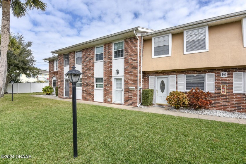 With a low monthly association fee, Colonial Townhomes provide - Beach Condo for sale in South Daytona, Florida on Beachhouse.com