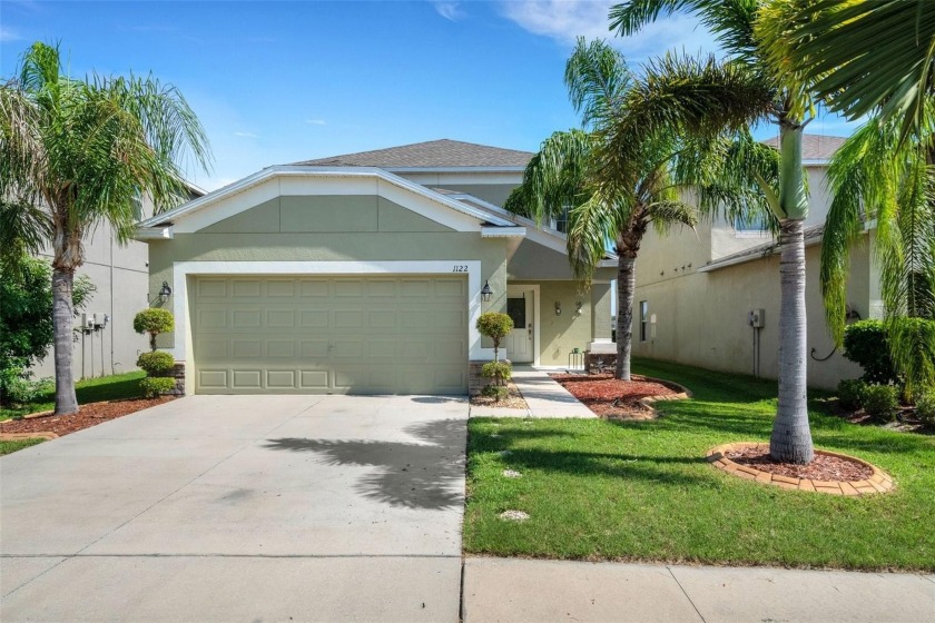 Welcome to this delightful two-story home on the water, nestled - Beach Home for sale in Ruskin, Florida on Beachhouse.com