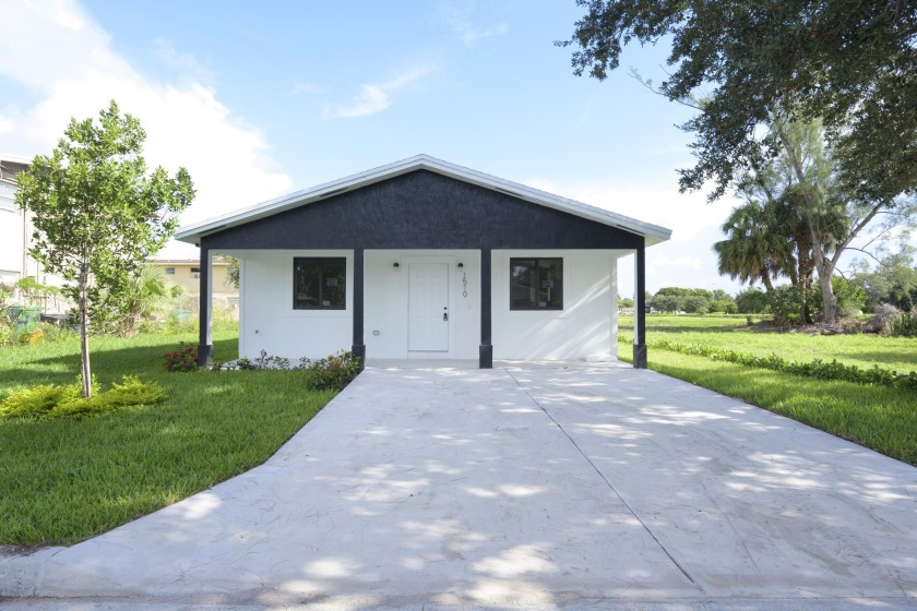 Step into your dream home with this exquisite brand new - Beach Home for sale in Riviera Beach, Florida on Beachhouse.com