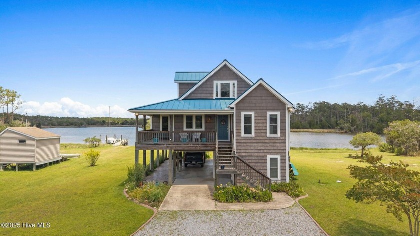 In the serene community of Cabin Creek sits a lovely home - Beach Home for sale in Merritt, North Carolina on Beachhouse.com