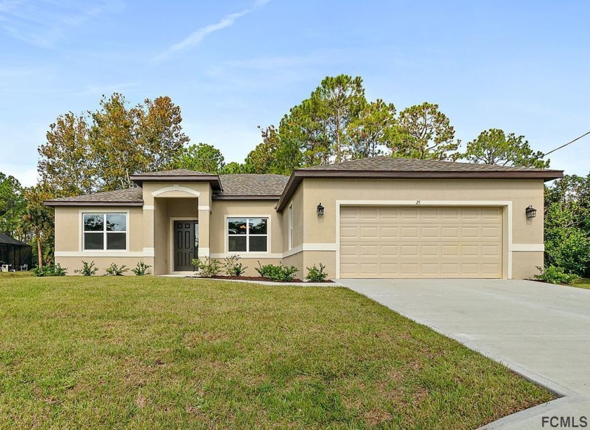 Brand New Home On A Fresh Water Canal ! Ready To Move In - Beach Home for sale in Palm Coast, Florida on Beachhouse.com
