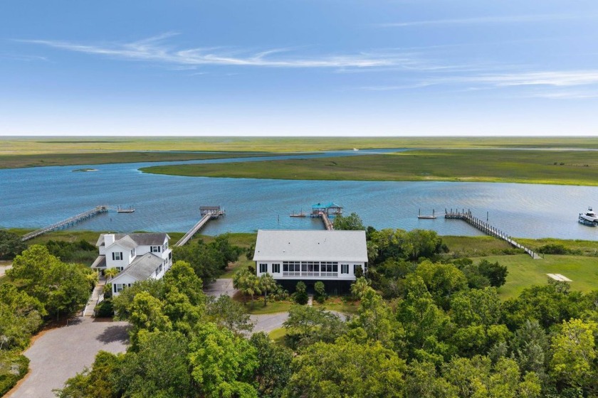 Welcome to 315 Lofton Ct - This unique waterfront property is - Beach Home for sale in Mcclellanville, South Carolina on Beachhouse.com