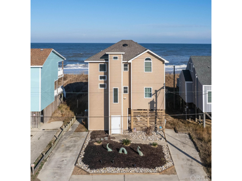 This beautifully updated, 3 bedroom oceanfront home has 2 - Beach Home for sale in Kill Devil Hills, North Carolina on Beachhouse.com