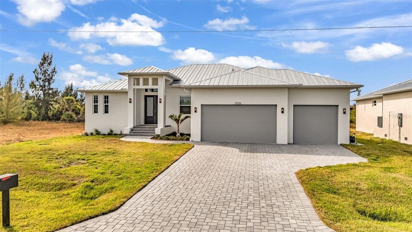 Welcome to this stunning brand-new custom built home in the - Beach Home for sale in Port Charlotte, Florida on Beachhouse.com