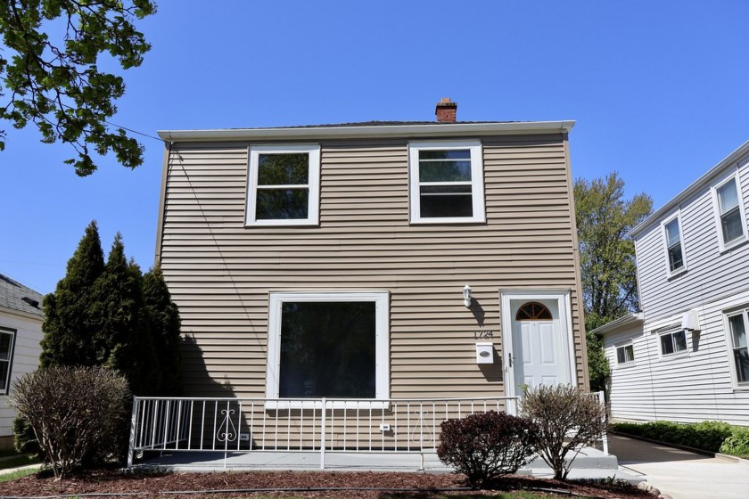 Welcome to this beautifully updated Colonial that mixes classic - Beach Home for sale in Saint Francis, Wisconsin on Beachhouse.com