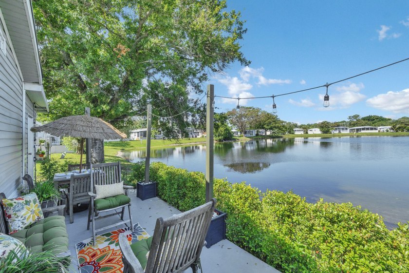 JUST LISTED!!! Lakefront 3BR/2BA with Florida room and tile - Beach Home for sale in Lake Worth, Florida on Beachhouse.com