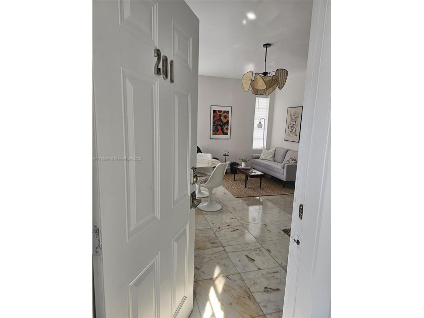 Bright a completely reenovated corner unit one bedroom PLUS DEN - Beach Condo for sale in Miami Beach, Florida on Beachhouse.com