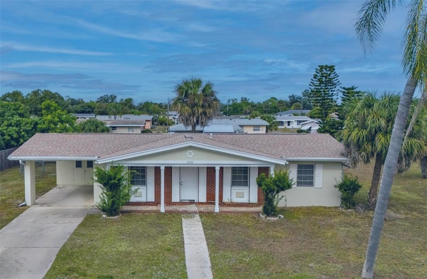 Discover the charm of 22182 Laramore Ave in Port Charlotte, FL - Beach Home for sale in Port Charlotte, Florida on Beachhouse.com