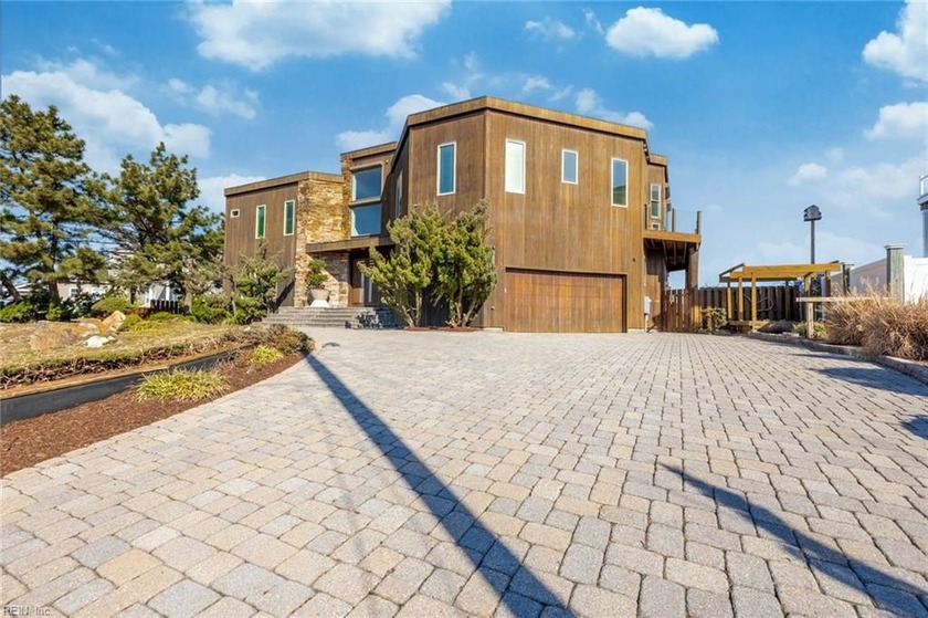 Experience coastal luxury in this 5,063 sq. ft. North End - Beach Home for sale in Virginia Beach, Virginia on Beachhouse.com