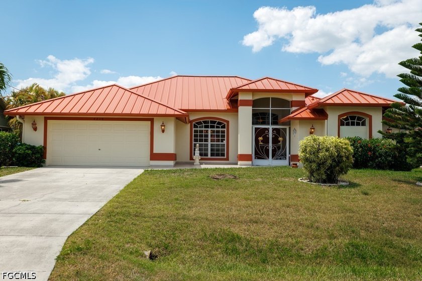 Welcome to this beautifully maintained one-owner home offering - Beach Home for sale in Cape Coral, Florida on Beachhouse.com