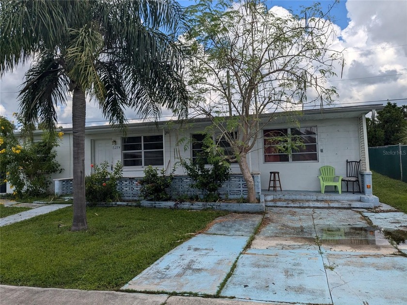 This spacious 4-bedroom, 2-bath home is full of potential and - Beach Home for sale in North Port, Florida on Beachhouse.com