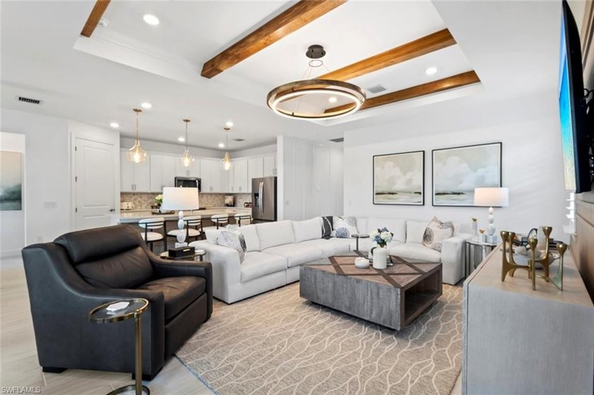 BREATHTAKING WATER VIEWS and DESIGNER FINISHES await in this - Beach Home for sale in Ave Maria, Florida on Beachhouse.com