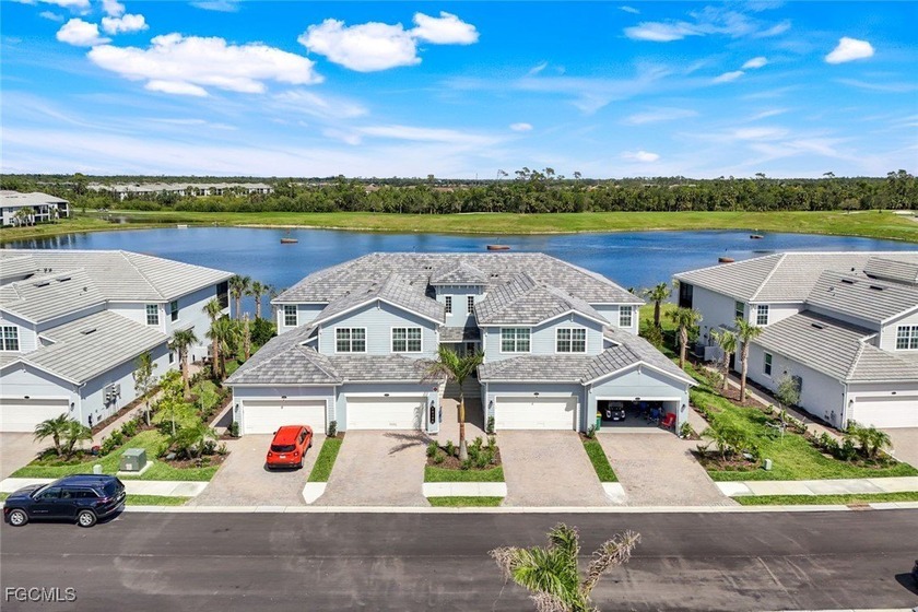 Beautiful Lakefront Coach Home with Golf Course Views! With over - Beach Condo for sale in Punta Gorda, Florida on Beachhouse.com