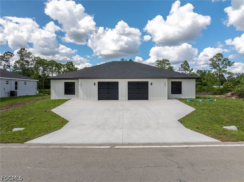 Brand-new construction duplex offering the opportunity to live - Beach Home for sale in Lehigh Acres, Florida on Beachhouse.com