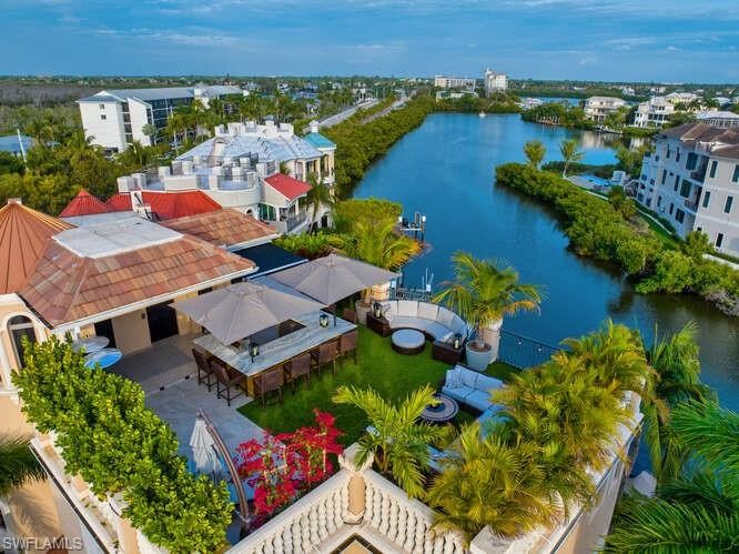 This stunning waterfront home boasts an enviable location just a - Beach Home for sale in Bonita Springs, Florida on Beachhouse.com