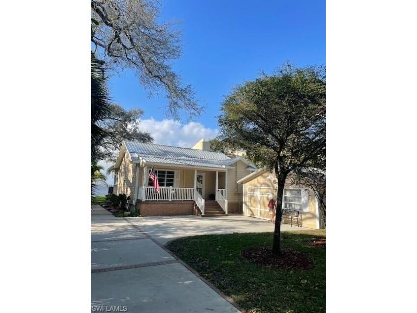 Live in Paradise! Enjoy the view from this beautiful riverfront - Beach Home for sale in Fort Myers, Florida on Beachhouse.com
