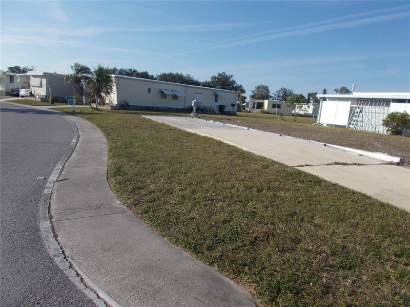 Vacant land in sought after 55+ Gated Community of Holiday Park - Beach Lot for sale in North Port, Florida on Beachhouse.com