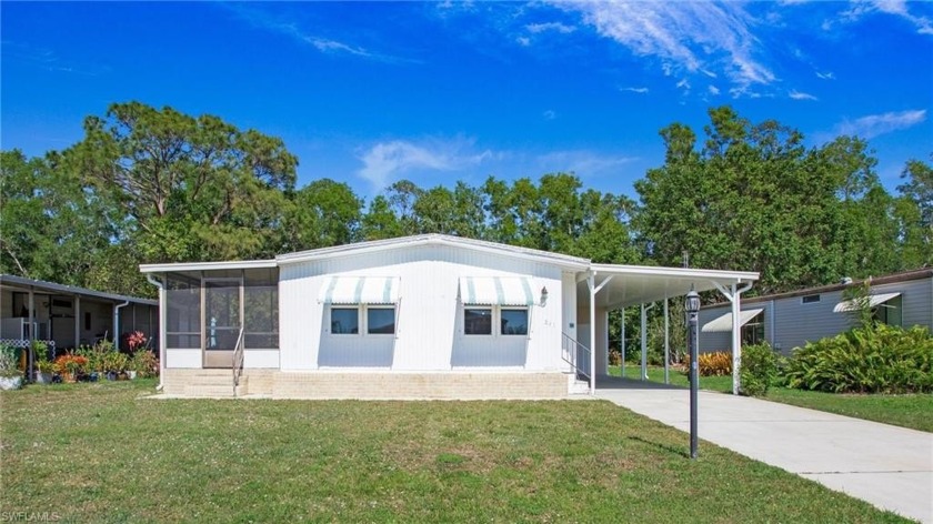 Lovely updated home on a canal offers serene views and much - Beach Home for sale in Naples, Florida on Beachhouse.com