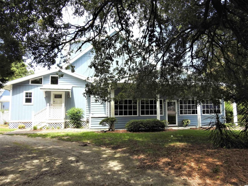 Escape to the complete privacy of this charming home hidden in - Beach Home for sale in Murrells Inlet, South Carolina on Beachhouse.com